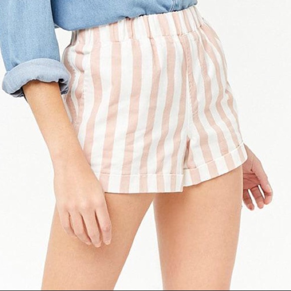 Pink & white high waisted shorts.
